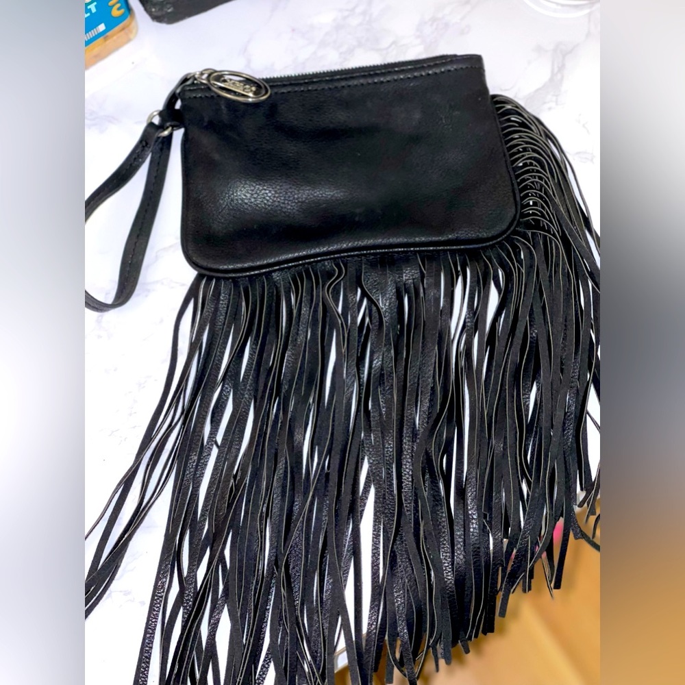 Carlos Santana wristlet purse